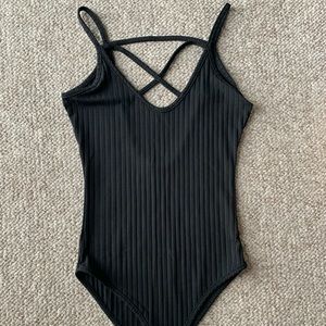 Never worn! Black body suit